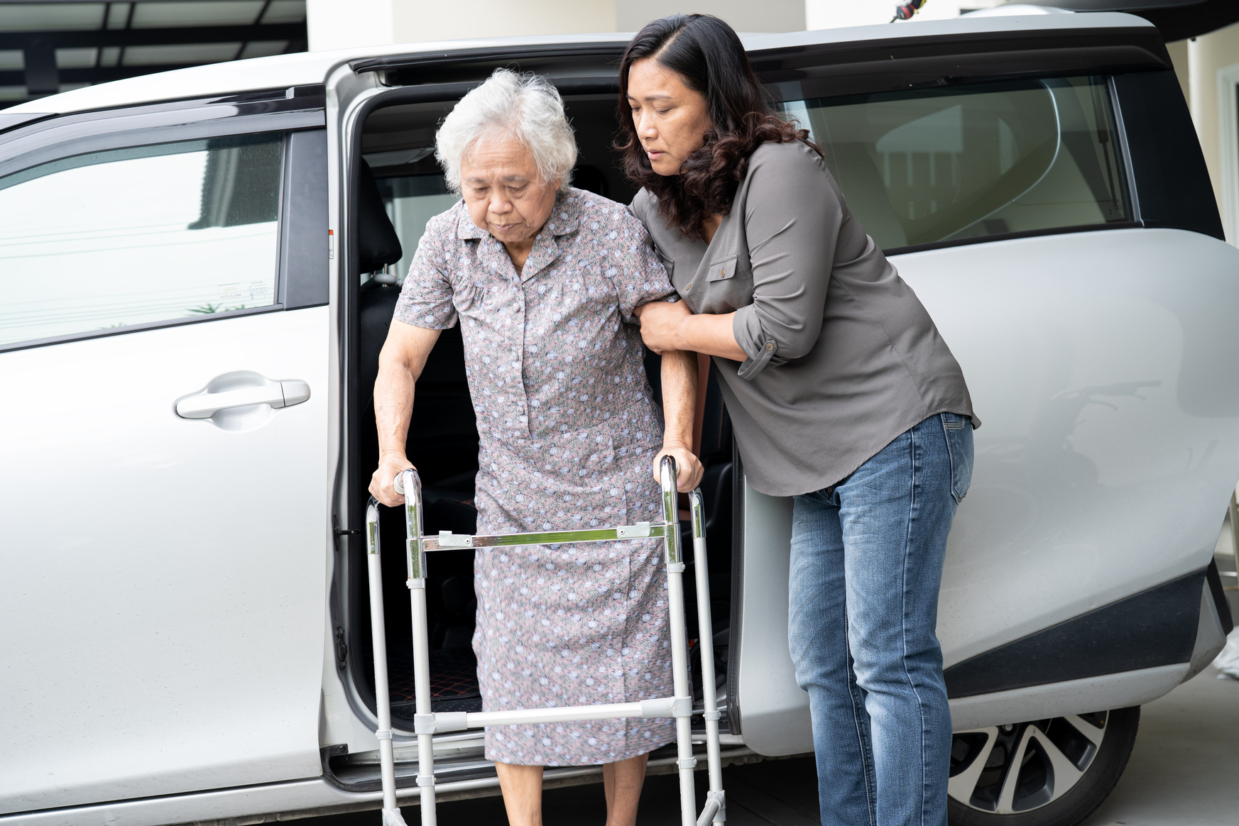 Caregiver Daughter Help and Support Asian Senior or Elderly Old
